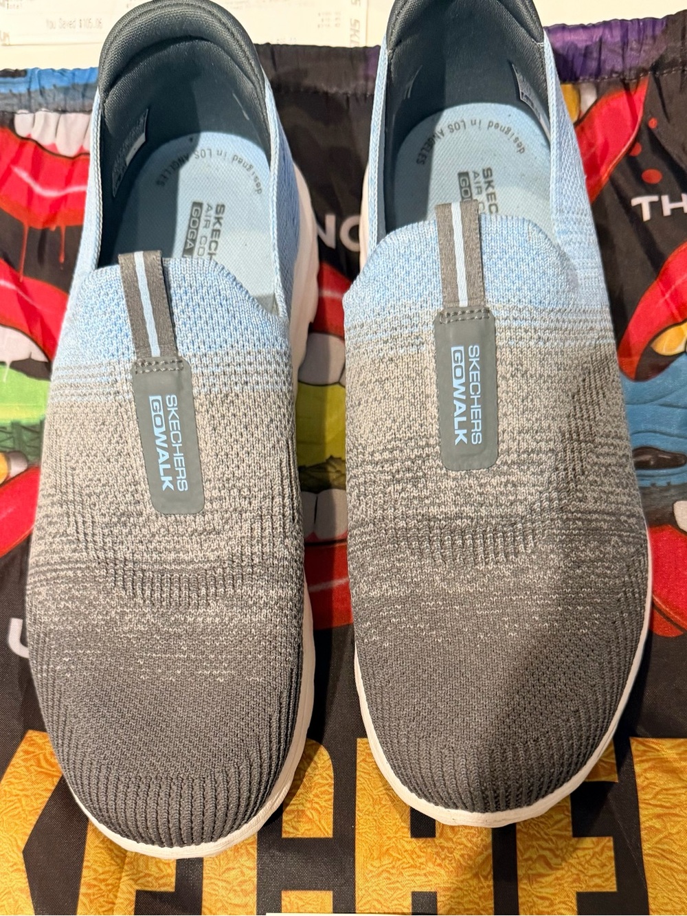 Skechers GOwalk Slip-On Sneakers in Gray and Light Blue